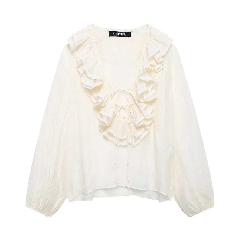 Rüschenbluse mit halbtransparentem Look